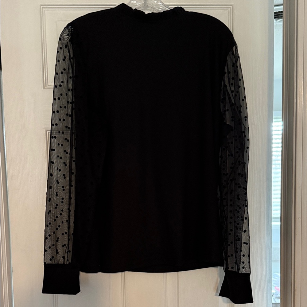 Elegant Black Top with Sheer Polka Dot Sleeves